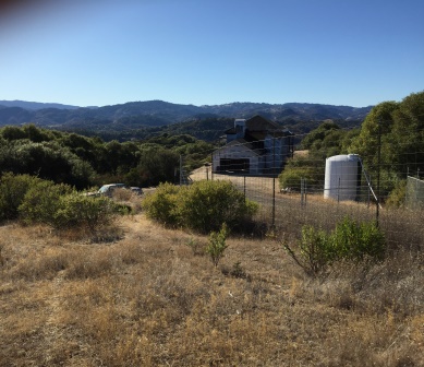 01Exterior Garage and driveway long shot to West.JPG